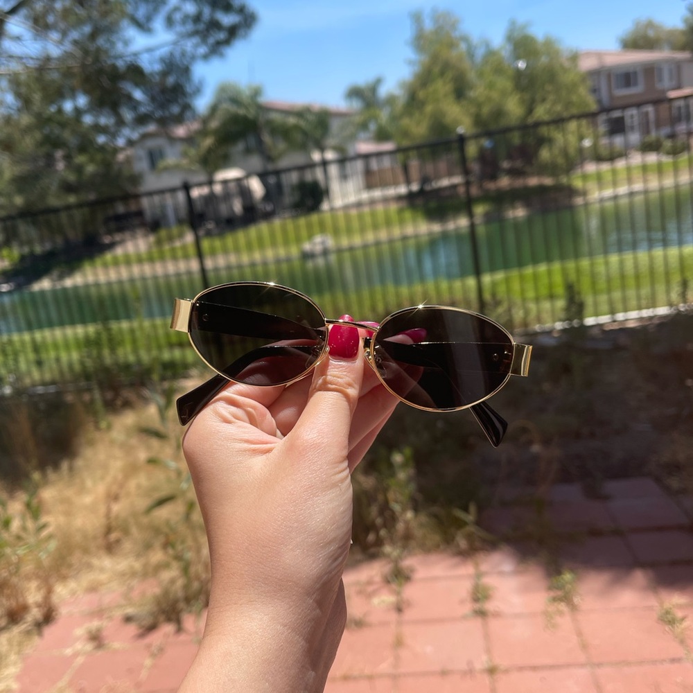 Gold rim sunglasses